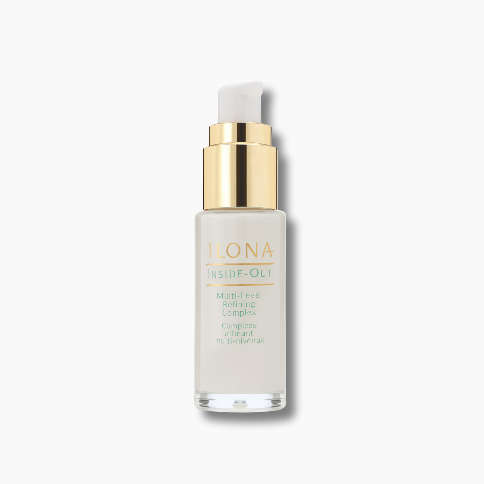 Inside-Out skincare serum bottle with gold cap on a light gray background